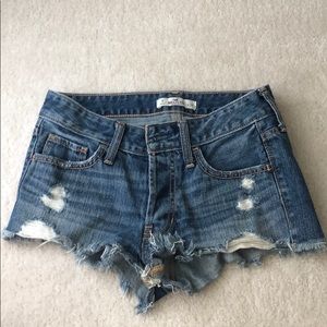 Denim cutoff shorts with distressing